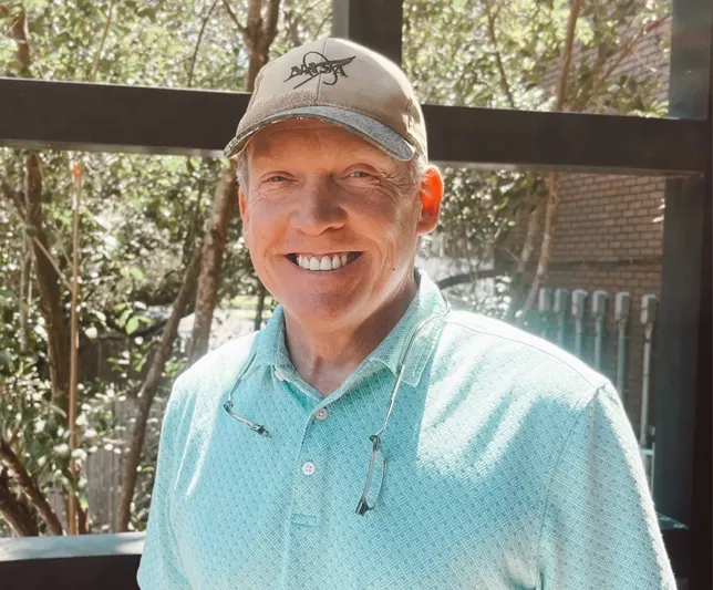 Dr. Duke Vinson smiling outdoors at New Day Recovery center.