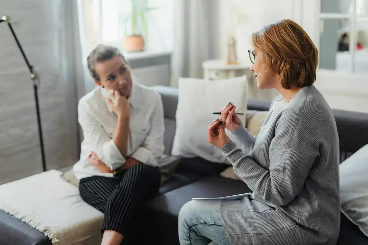 Two women in discussion during a counseling session