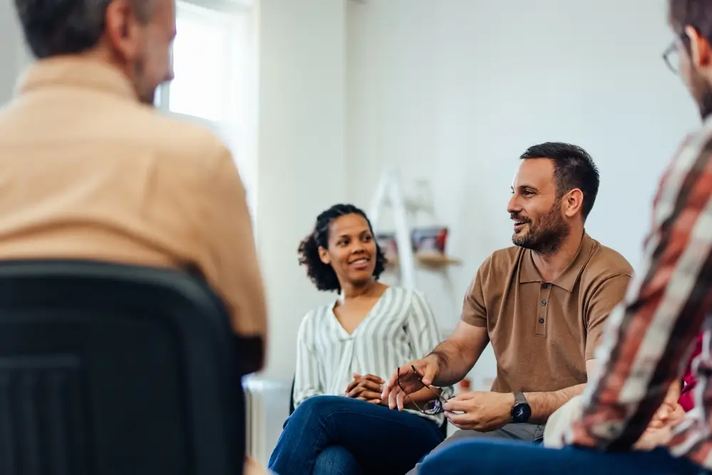 Couple talking with a counselor in an office