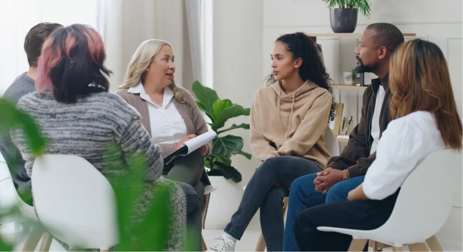 Group therapy circle in discussion