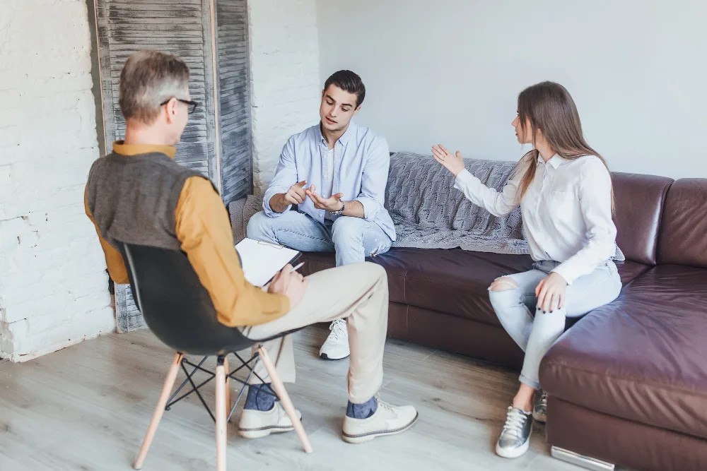 Family talking together during a counseling session