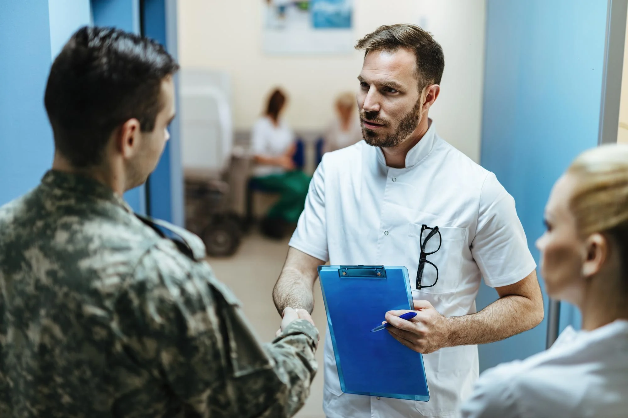 Service member consulting with a clinician