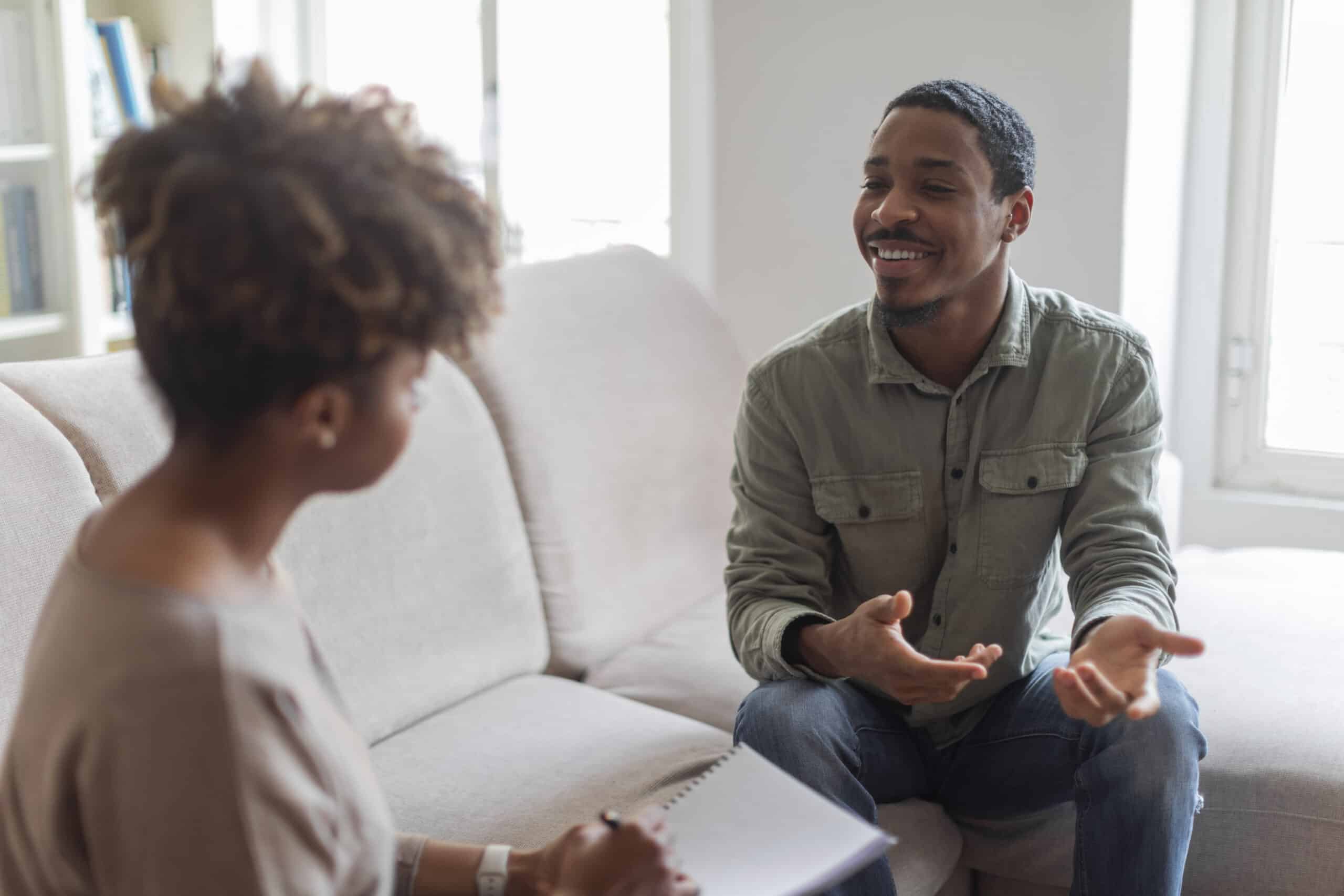 A man talking with a doctor in a detox san antonio program.